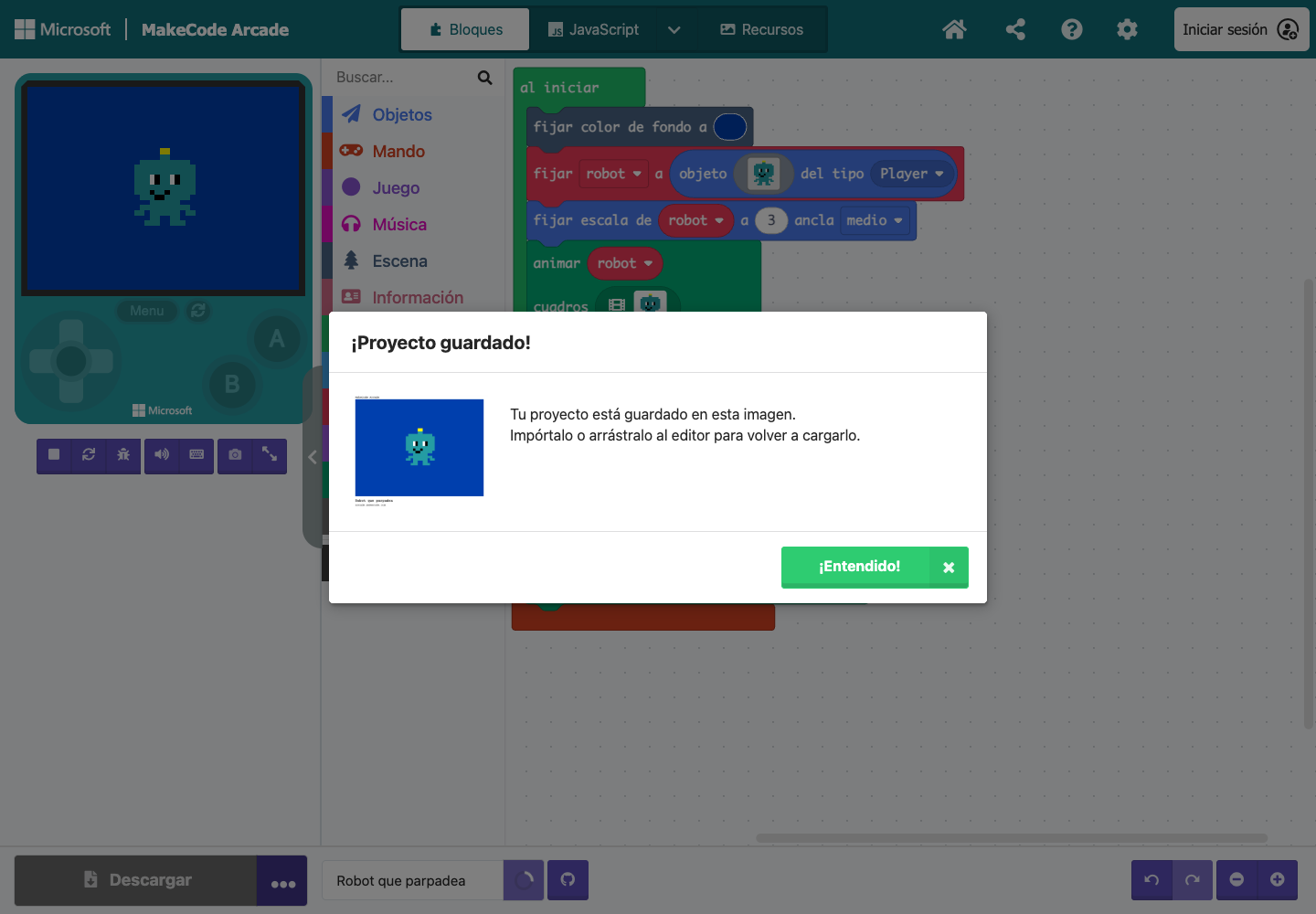 Captura real del aviso de guardado de MakeCode: el archivo PNG contiene el proyecto y puede importarse otra vez.